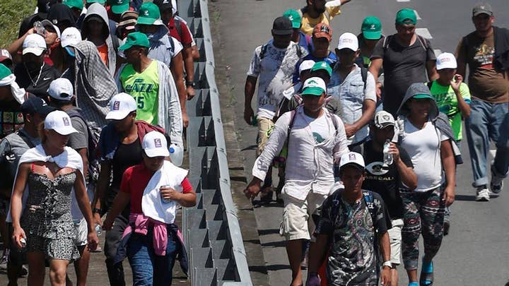 Showdown heads to the US border as caravan doubles in size