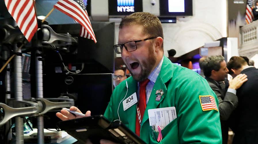 Dow enters busy earnings week; Taco Bell base promotion back