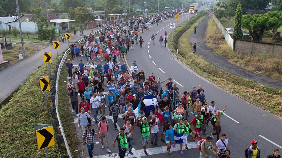 As caravan approaches, Trump warns he'll cut aid to ...