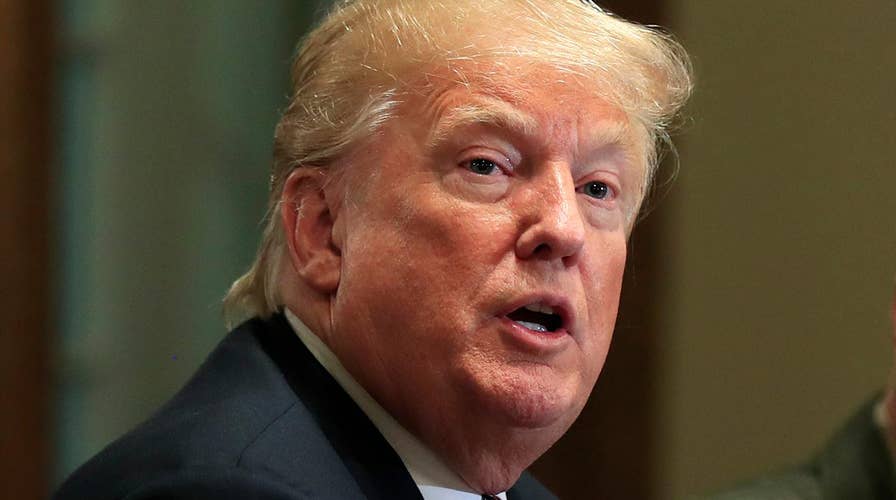 Trump defends immigration policy as caravan approaches US