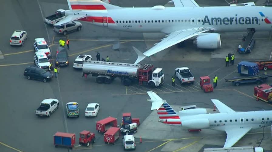 Fuel truck hits plane at LaGuardia Airport