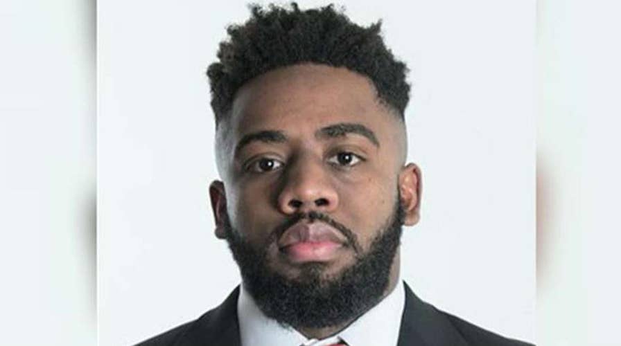 Rutgers football player charged in double murder plot