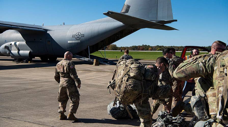 Trump says up to 15,000 troops may be sent to the border