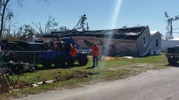 Home tipped over by Hurricane Michael gets tipped back by pack of Jeep Wranglers