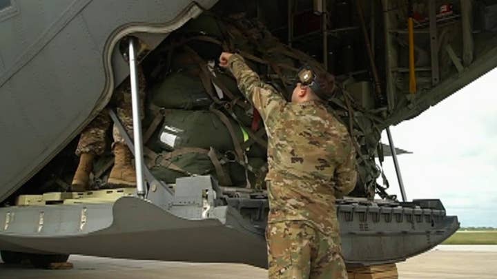 Raw Video: Troops and military equipment arrive in Texas