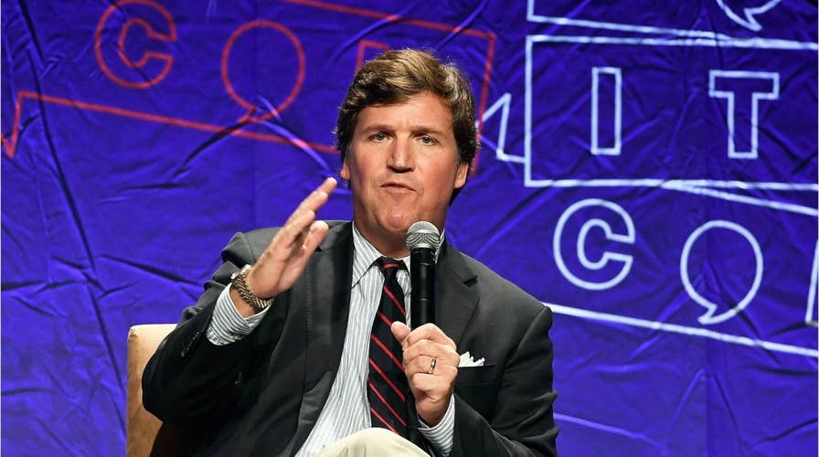 Mob chants threats outside Tucker Carlson's D.C. home