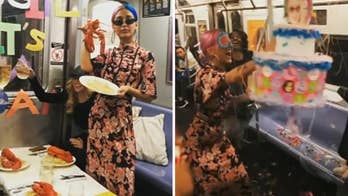 Woman throws birthday party on NYC subway, dines on lobster and pasta