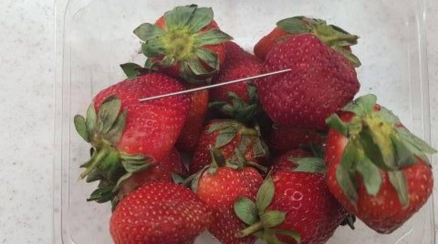 Needles in strawberries lands woman in jail