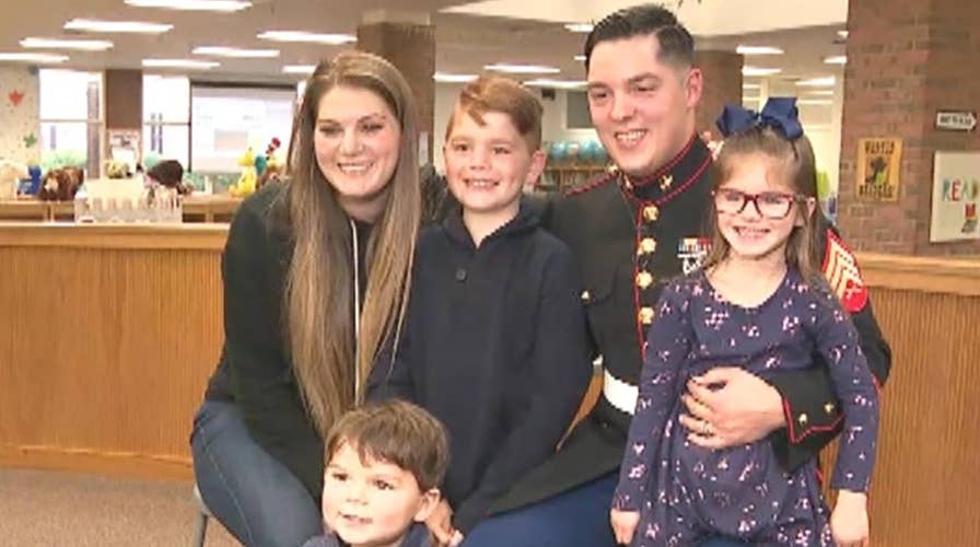Marine sergeant surprises his kids at their school