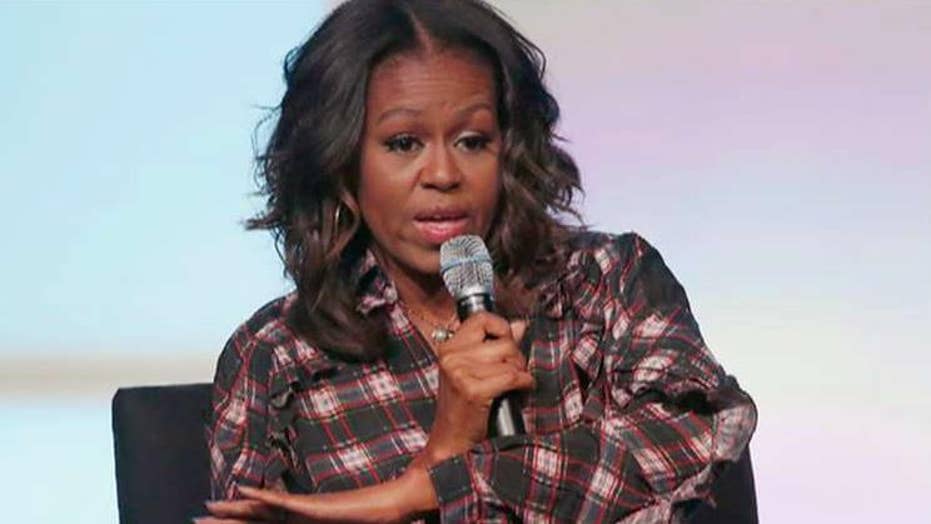 michelle obama wearing thigh high boots
