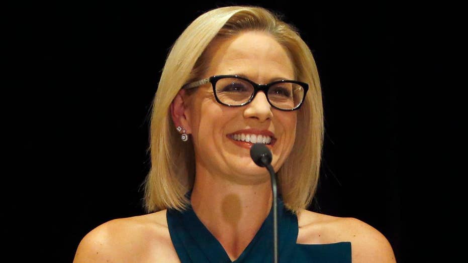 Sinema turns historically red seat blue in Arizona