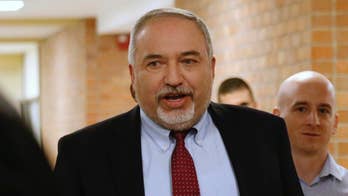 Israeli defense minister quits over cease-fire