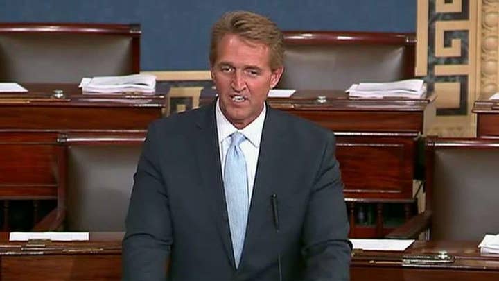 Sen. Flake threatens judicial nominations to protect Mueller