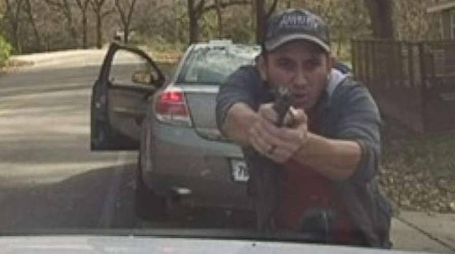 Dramatic video: police dashcam captures dangerous shootout