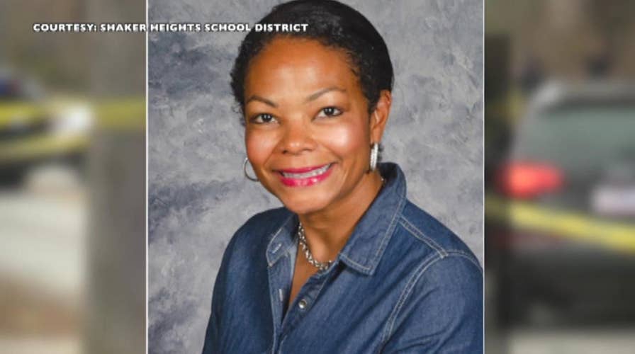 Former judge arrested after estranged wife is murdered