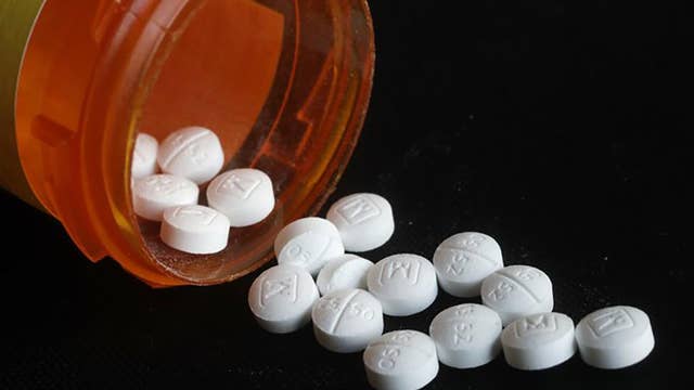Florida sues CVS, Walgreens over sale of opioids