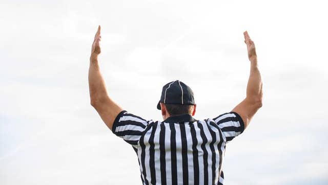 Football: High schooler's parent accused of wearing referee uniform