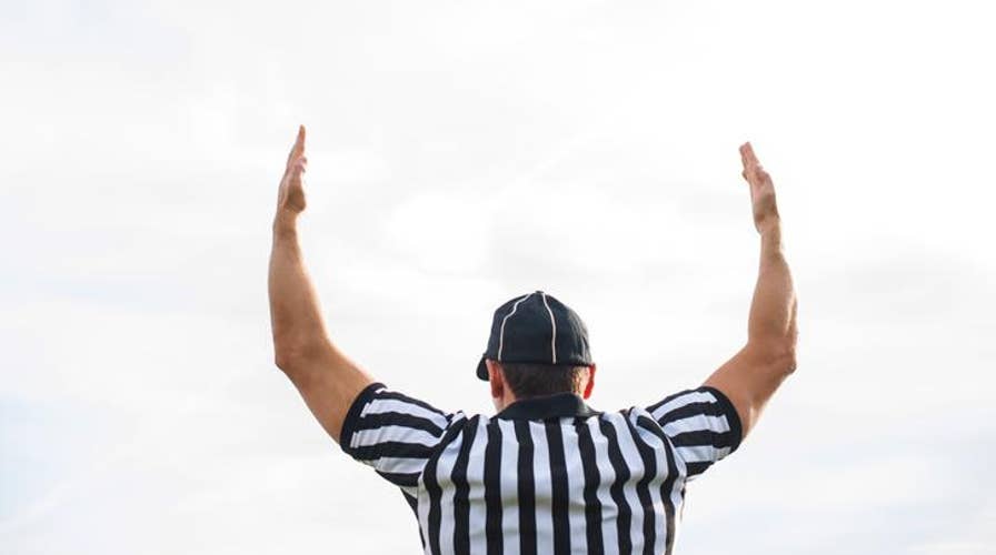 Football: High schooler's parent accused of wearing referee uniform