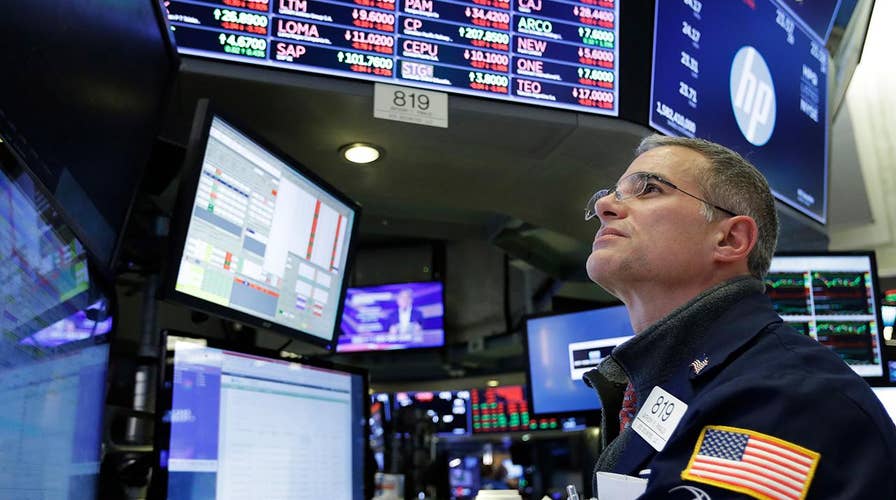 Dow plummets from all-time high, erasing year's gains