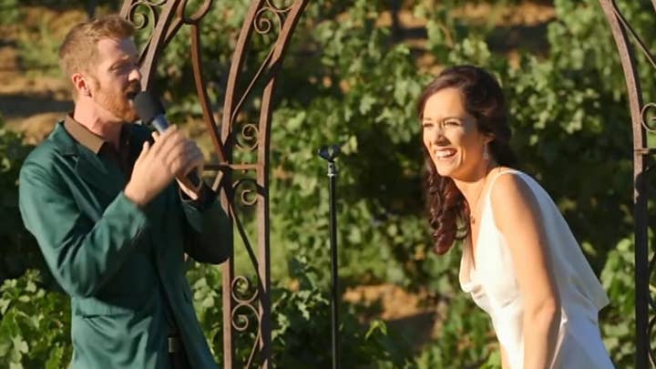 Bride and groom perform wedding vows as epic rap battle