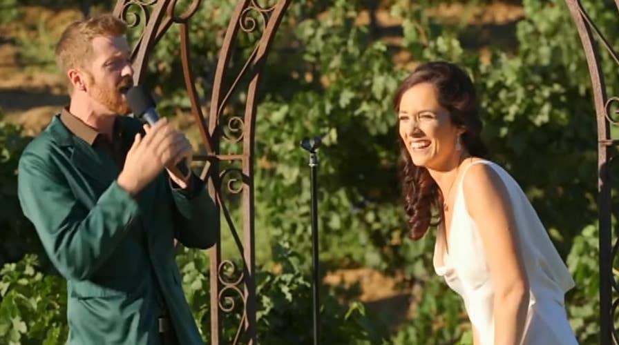 Bride and groom perform wedding vows as epic rap battle