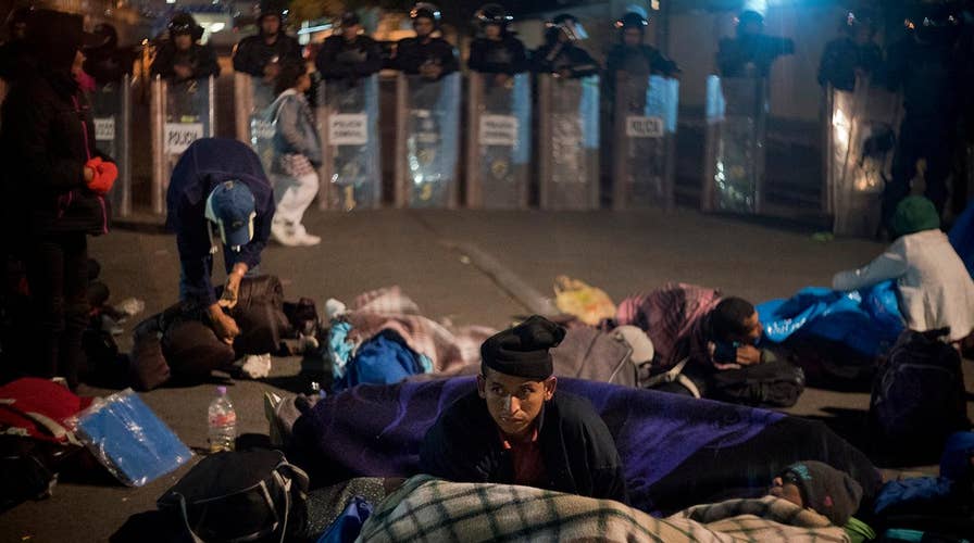 Report: Migrants march on border, protest living conditions