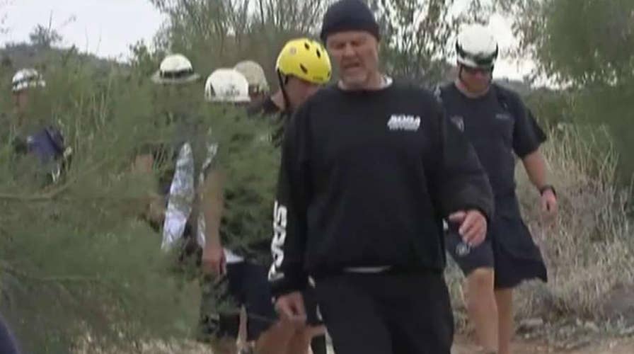 Crews save hiker trapped between boulders