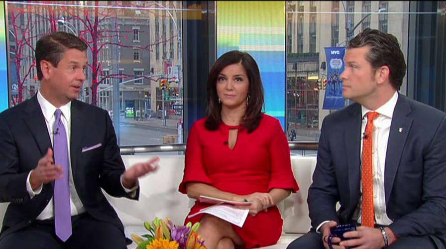 French protest gas tax hike, President Macron