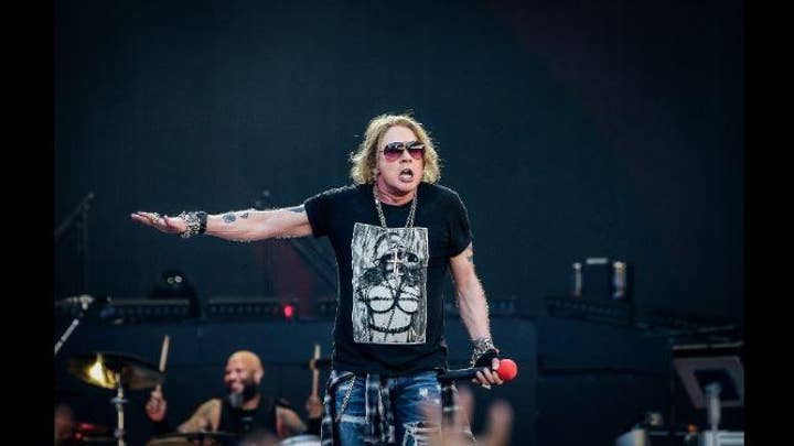 Guns N' Roses cuts show short due to Axl Rose's illness