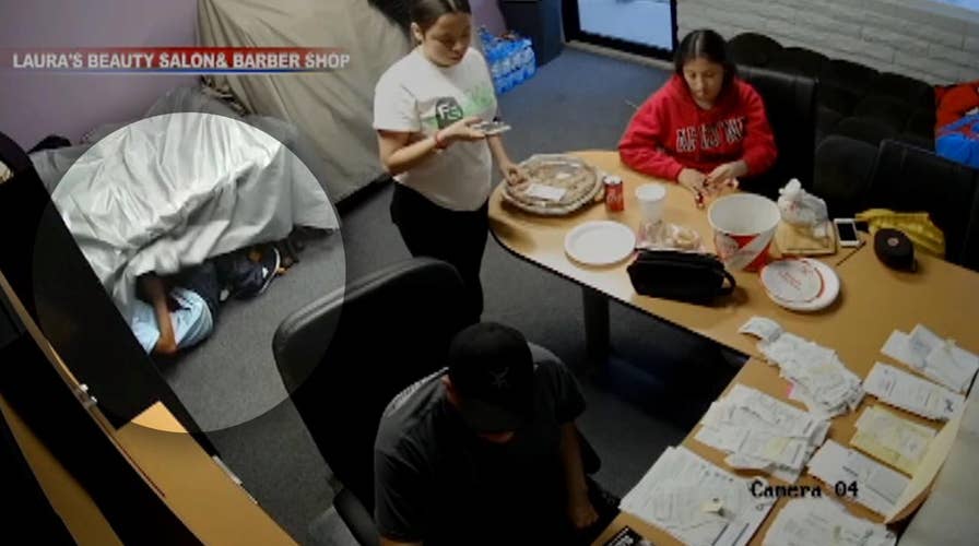 Suspect hides from police in barber shop inches from family
