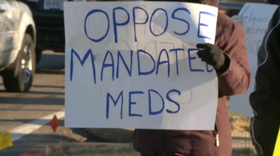 Protests after nurse allegedly fired for refusing flu shot