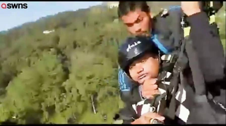 Paraglider pilot dies saving his passenger