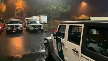 California wildfire zone slammed with flash flooding