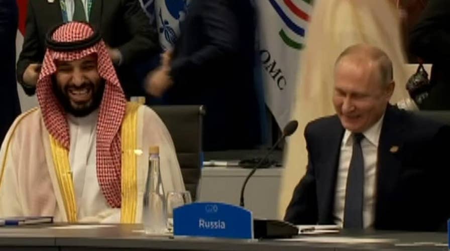 All smiles: Putin greets Saudi Crown Prince at G20 summit