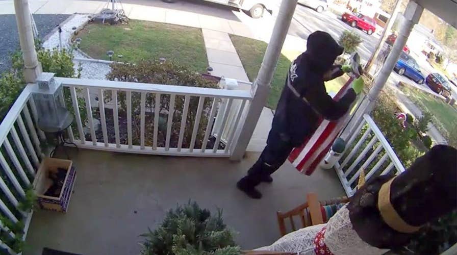 Veteran, FedEx driver is seen on camera folding fallen flag