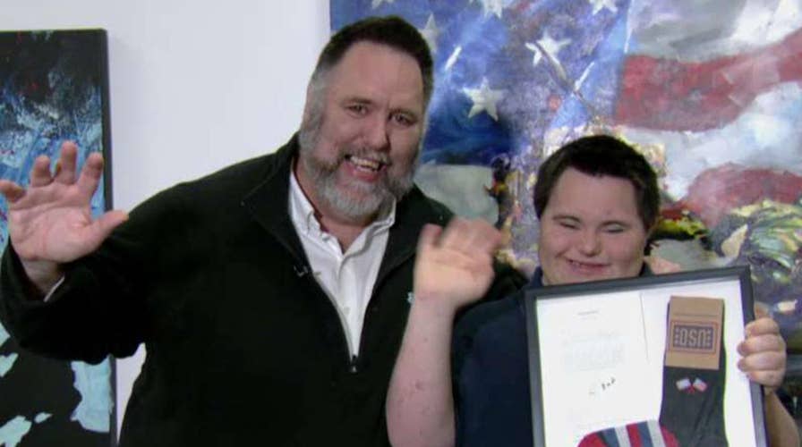 Bush, entrepreneur with Down syndrome bonded over socks