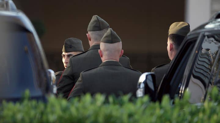 President George H.W. Bush's motorcade leaves funeral home