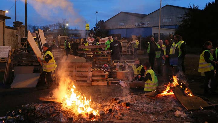 Riots force President Macron to reverse course on gas tax