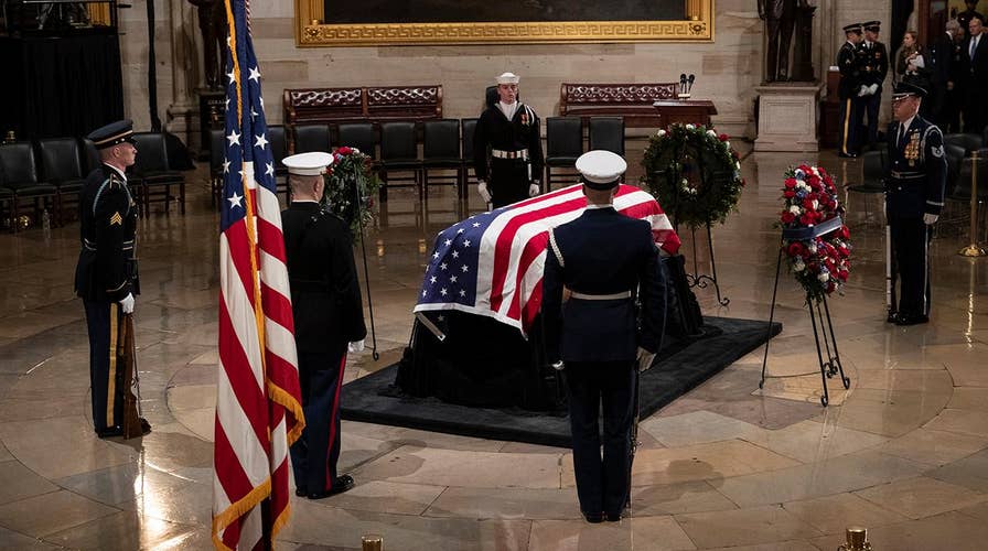 George H.W. Bush lies in state in Capitol Rotunda