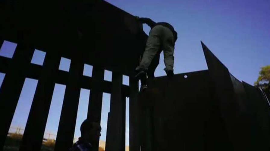 Several migrants breach US-Mexico border