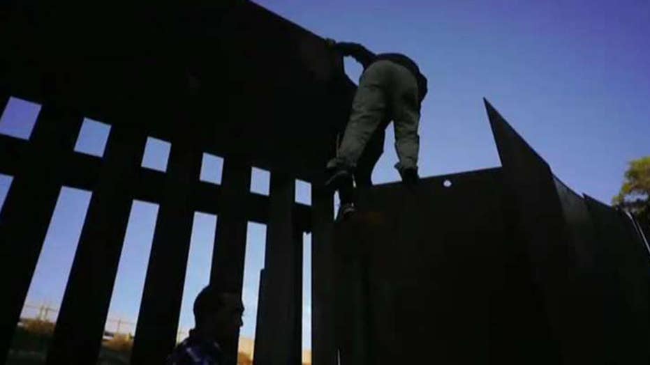 Several migrants breach US-Mexico border