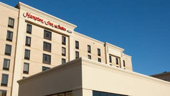 Hotel guest suing Hilton for $100 million, claims 'perv' filmed her showering and used footage to blackmail her