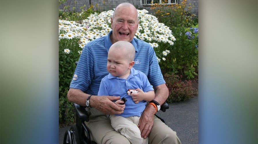 Bush once shaved head to support Secret Service agent's son