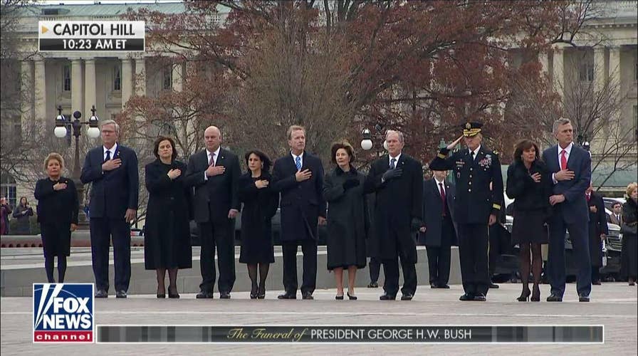 Casket of George H.W. Bush departs Capitol.