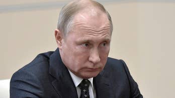 Putin threatens new nuclear arms race with US