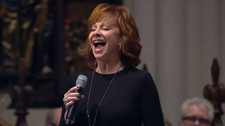 Reba McEntire sings 'The Lord's Prayer' at Bush's funeral