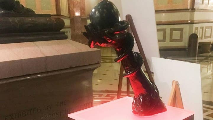 Satanic Temple statue joins Christmas display in Illinois Capitol