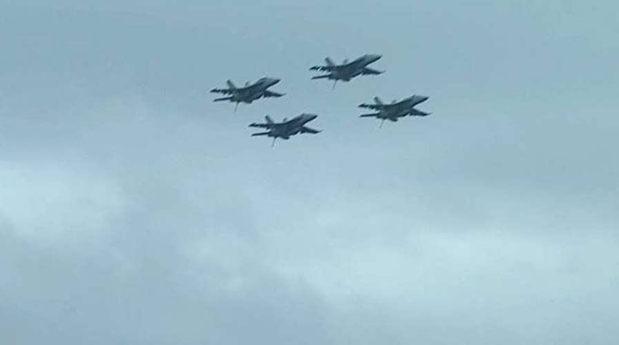 21-aircraft flyover honors former President George H.W. Bush