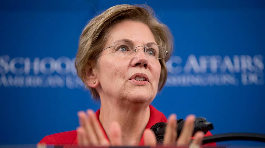 Warren stands by controversial DNA test