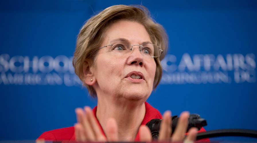 Warren stands by controversial DNA test